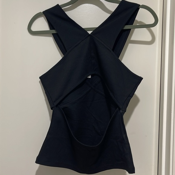 NEW H&M black shirt. Open on the back. Size small - Picture 2 of 3